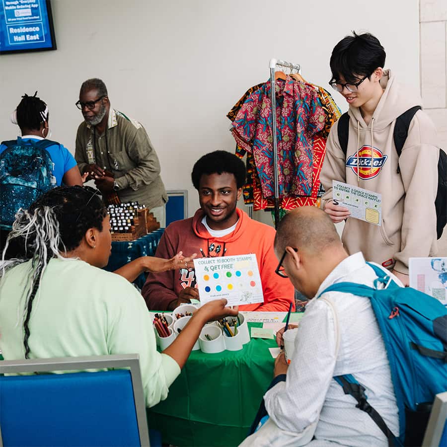 Group of students tabling at Walk with Grace event.
