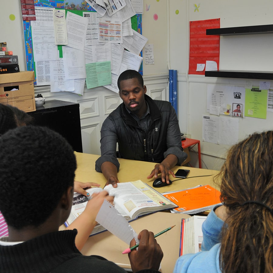 teacher with students in classroom